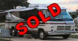 GMC Motorhome photograph with a red SOLD label